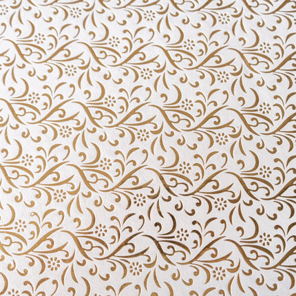 PAPEL ARTESANAL EMBOSADO CREMA DISEÑO DORADO 22X29PULG