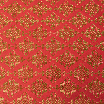 PAPEL ARTESANAL ROJO CON DISEÑO DORADO 22X29PULG