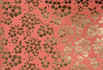 PAPEL ARTESANAL NARANJA DISEÑO FLORES DORADAS 22X29PULG