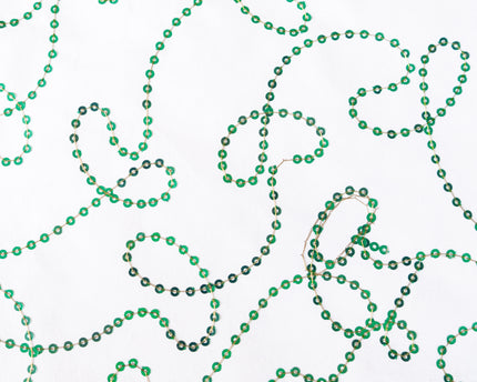 PAPEL DECORADO BLANCO C/LENTEJAS VERDE 22 X 29 PULG