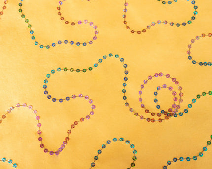PAPEL DECORADO MOSTAZA C/LENTEJAS MULTIC 22 X 29 PULG