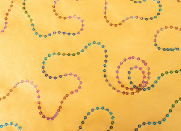PAPEL ARTESANAL CON LENTEJUELAS 22X29PULG