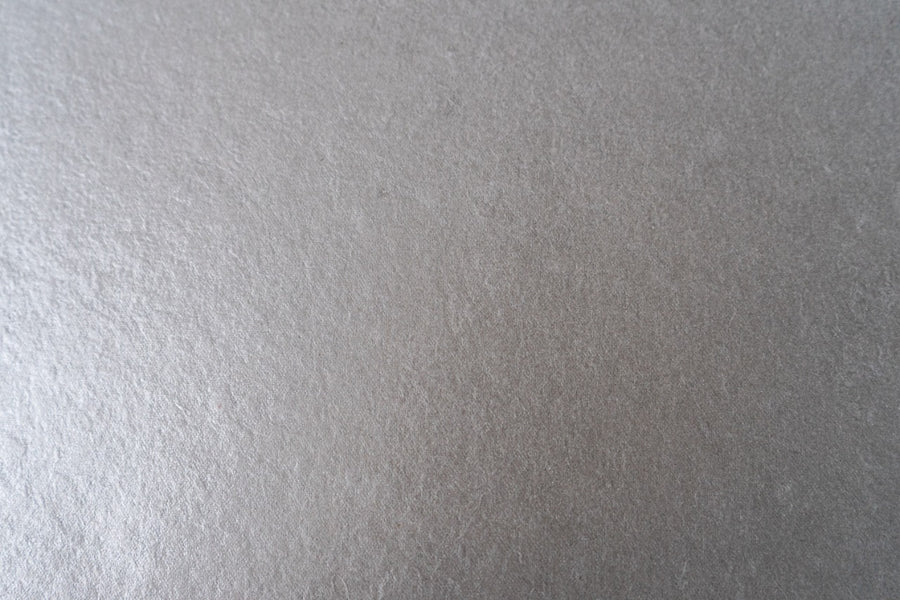 PAPEL ARTESANAL GRIS LISO 22X29PULG
