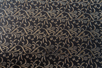 PAPEL ARTESANAL NEGRO CON DISEÑO PLATA 22X29PULG