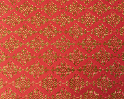 PAPEL ARTESANAL ROJO CON DISEÑO DORADO 22X29PULG