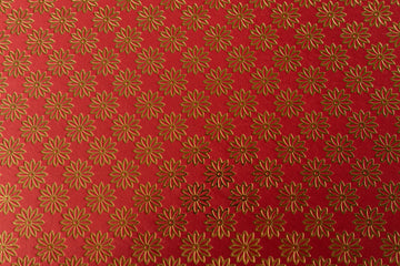 PAPEL ARTESANAL ROJO DISEÑO FLOR DORADA 22X29PULG