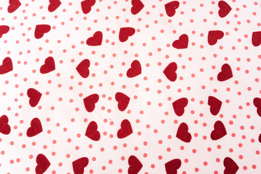 PAPEL ARTESANAL ROSADO CORAZONES ROJO 22X9PULG