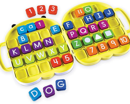 ALPHABEE SHAPED CASE W/40 ALPHABET TILES.