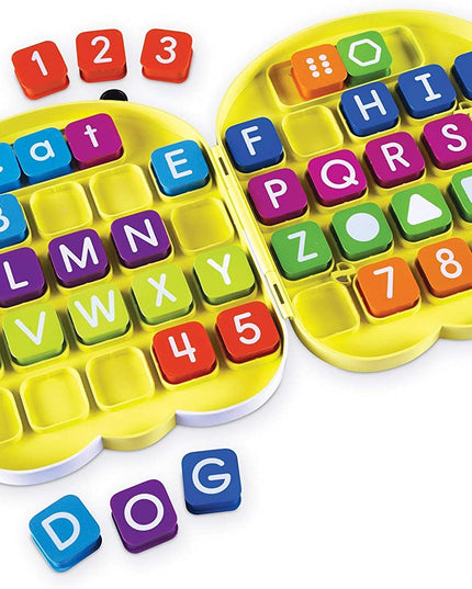 ALPHABEE SHAPED CASE W/40 ALPHABET TILES.